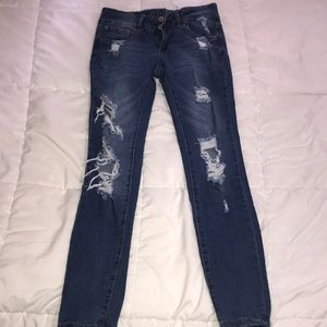 Mid Rise Ripped Jeans